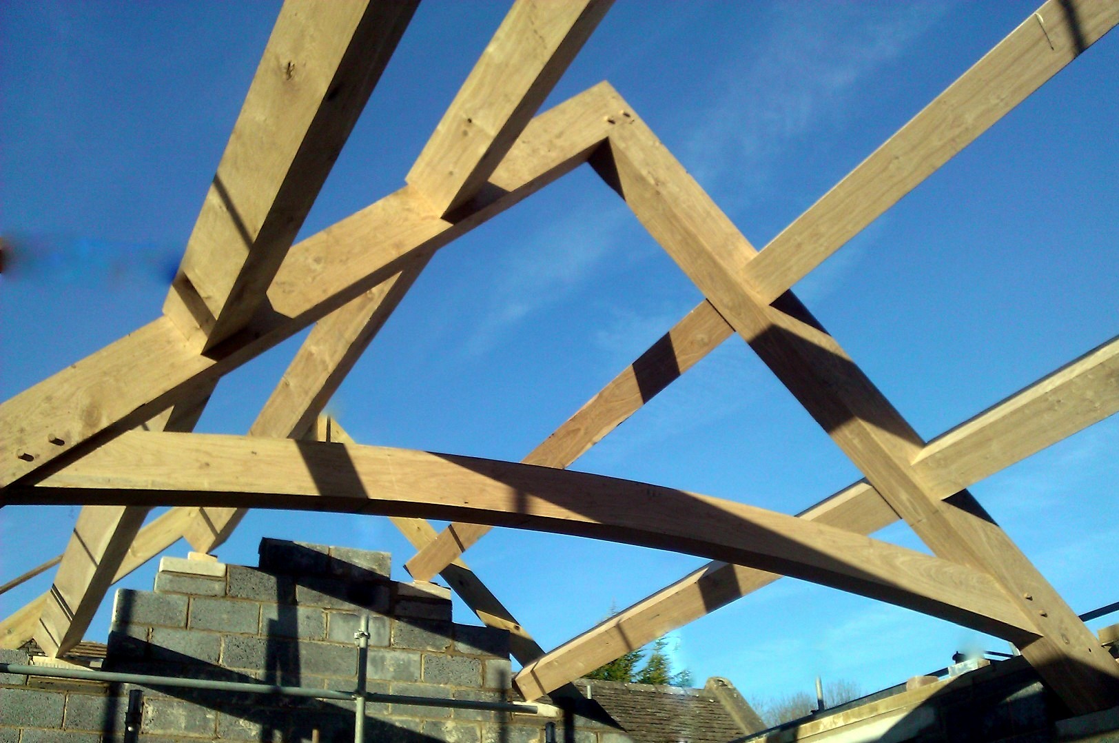 Curved tie oak truss sets