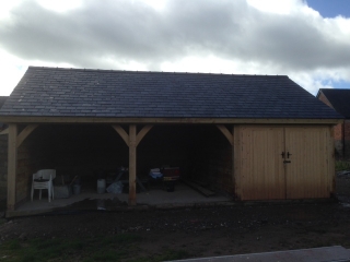Triple bay oak garage single storey