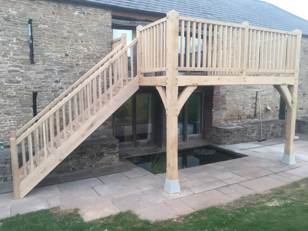 Oak balcony and staircase fitted to stone barn in Herefordshire