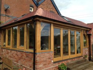 Oak framed conservatory with bi folding doors