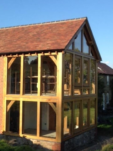 Two storey oak and glass extension