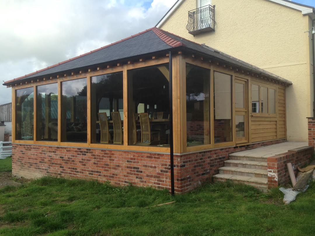 Oak framed extension with floor to ceiling glass