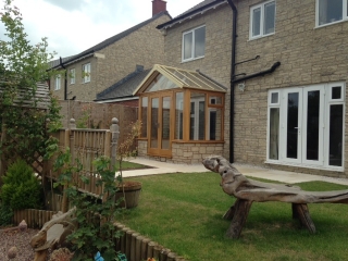 Enclosed oak porch fitted on stone wall