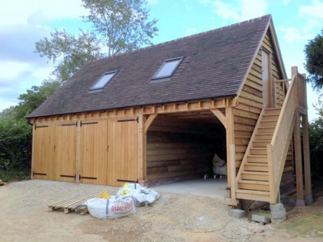 Triple bay oak garage with upstairs office