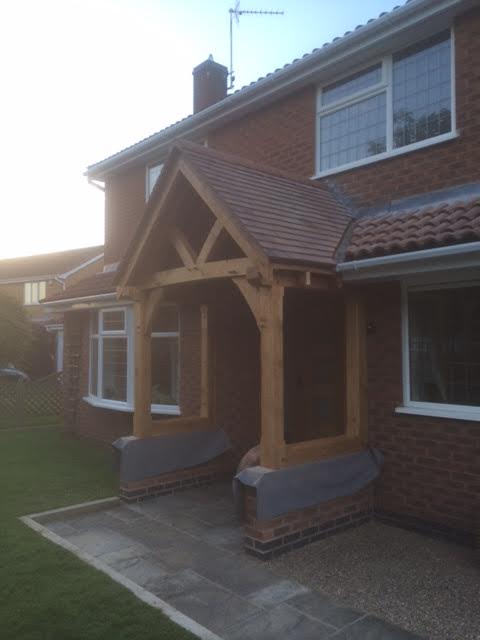 Open oak porch with curved braces