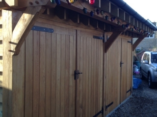 Double bay enclosed oak garage