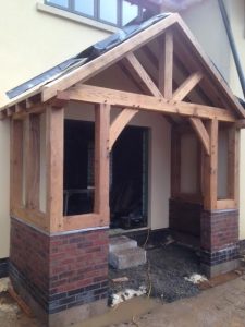 Oak framed porch ready to enclose with glass and door