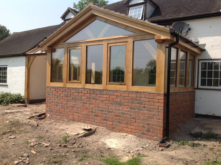 Oak Framed Conservatory on a brick dwarf wall Wye Oak