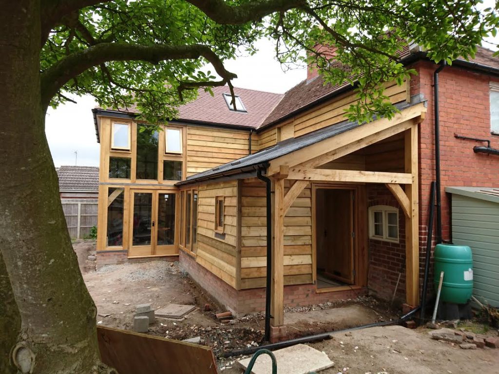 Oak framed two storey extension with lean too porch