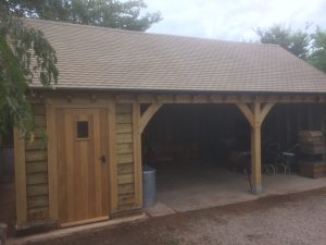 Three bay oak framed garage with workshop