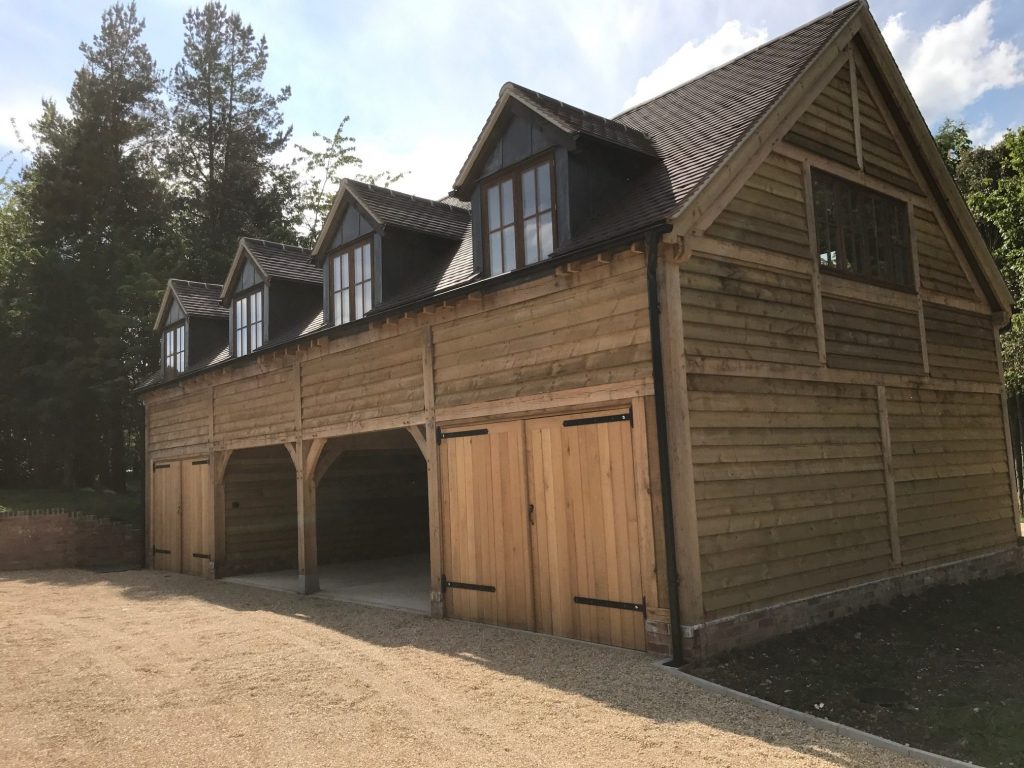 A two storey oak framed garage in Worcestershire – Wye Oak